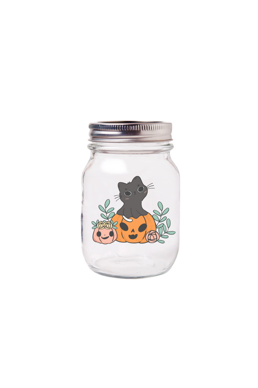 Cat in pumpkin candle